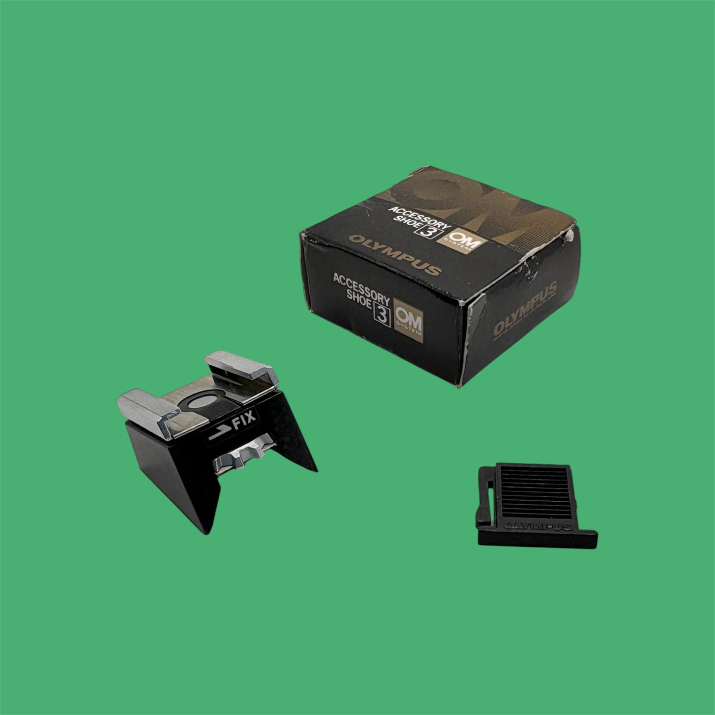 Griffe-flash Olympus Shoe n°3, boîte, notice & protection